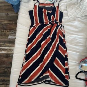 Navy, off white, and a burnt orange dress
